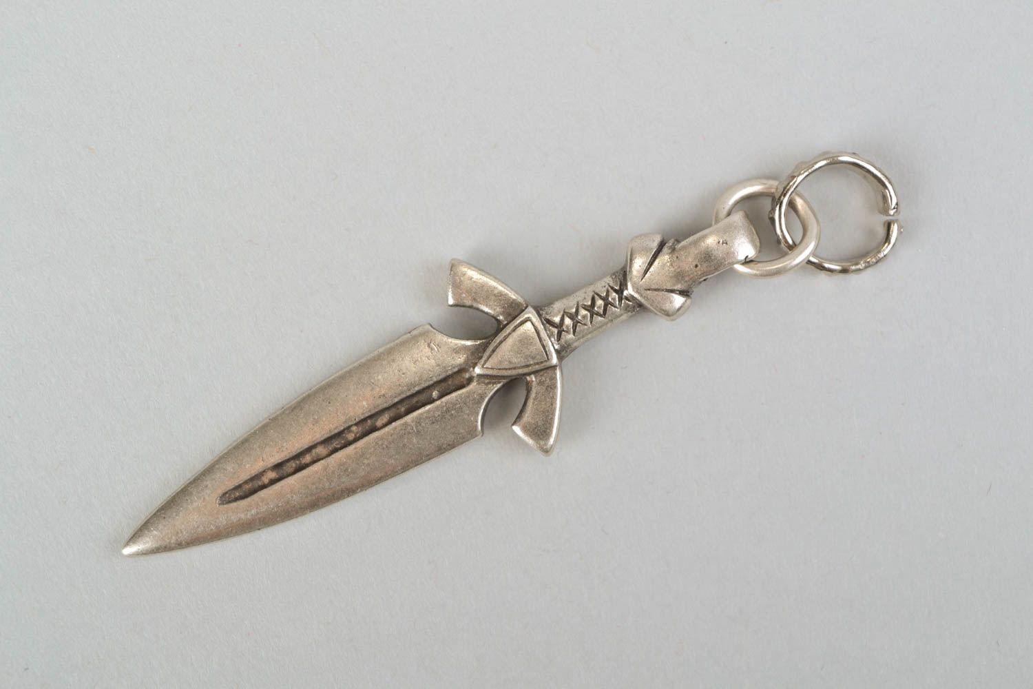 Metal pendant in the shape of sword photo 3