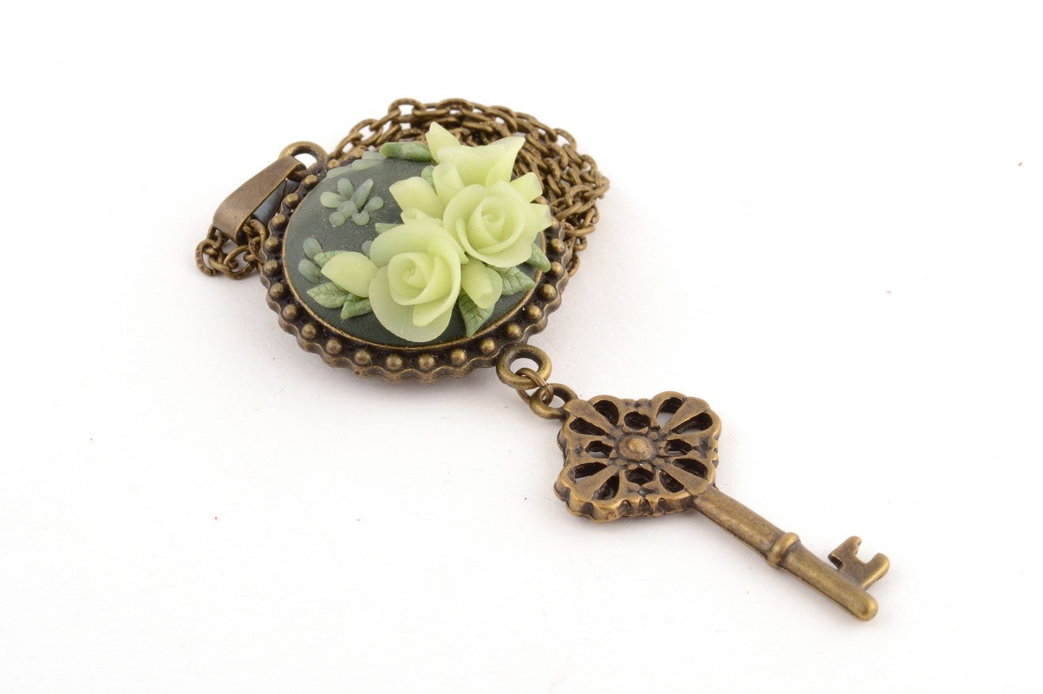 Handmade metal key shaped pendant on chain with light polymer clay flowers photo 4