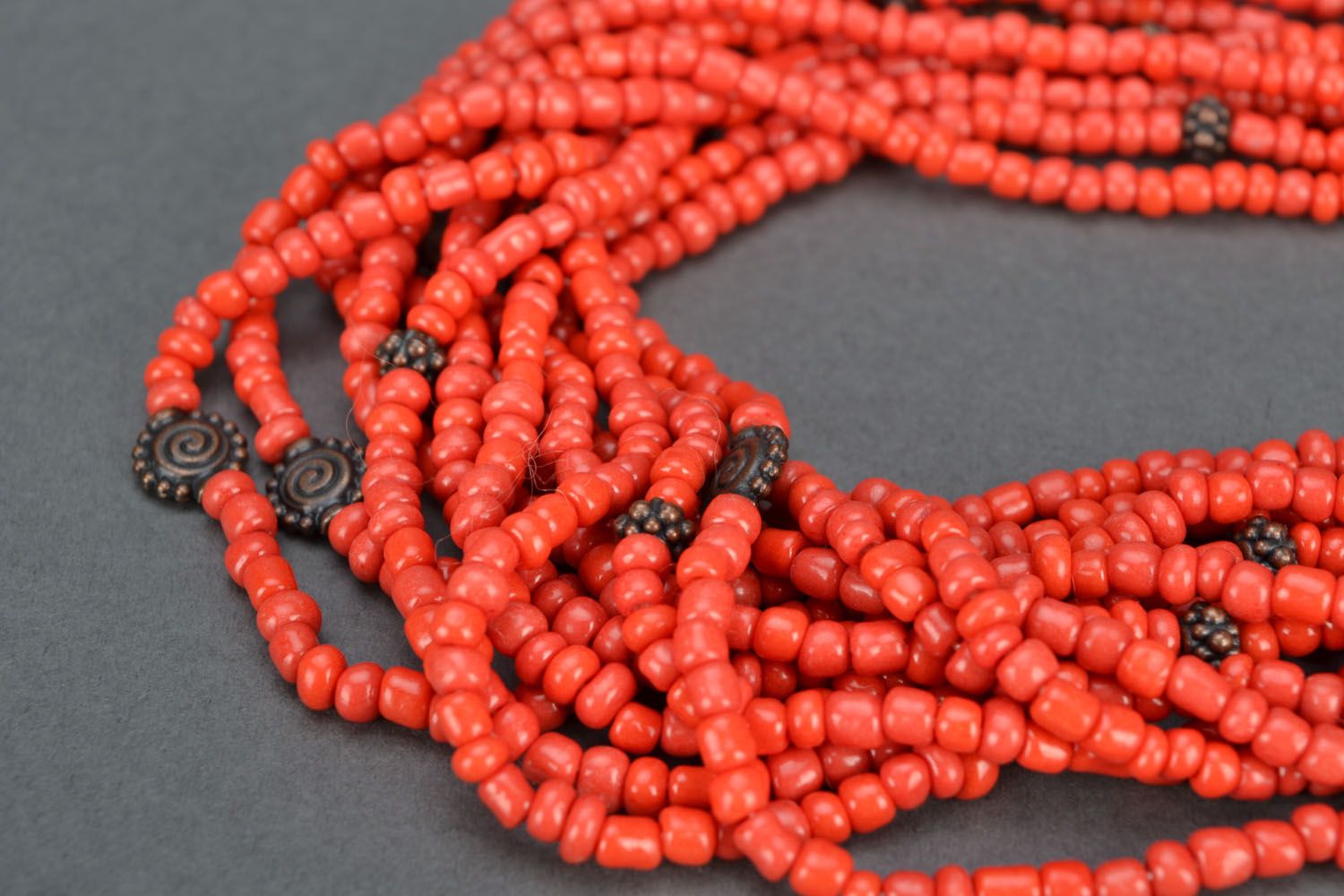 Beaded necklace of coral color photo 4