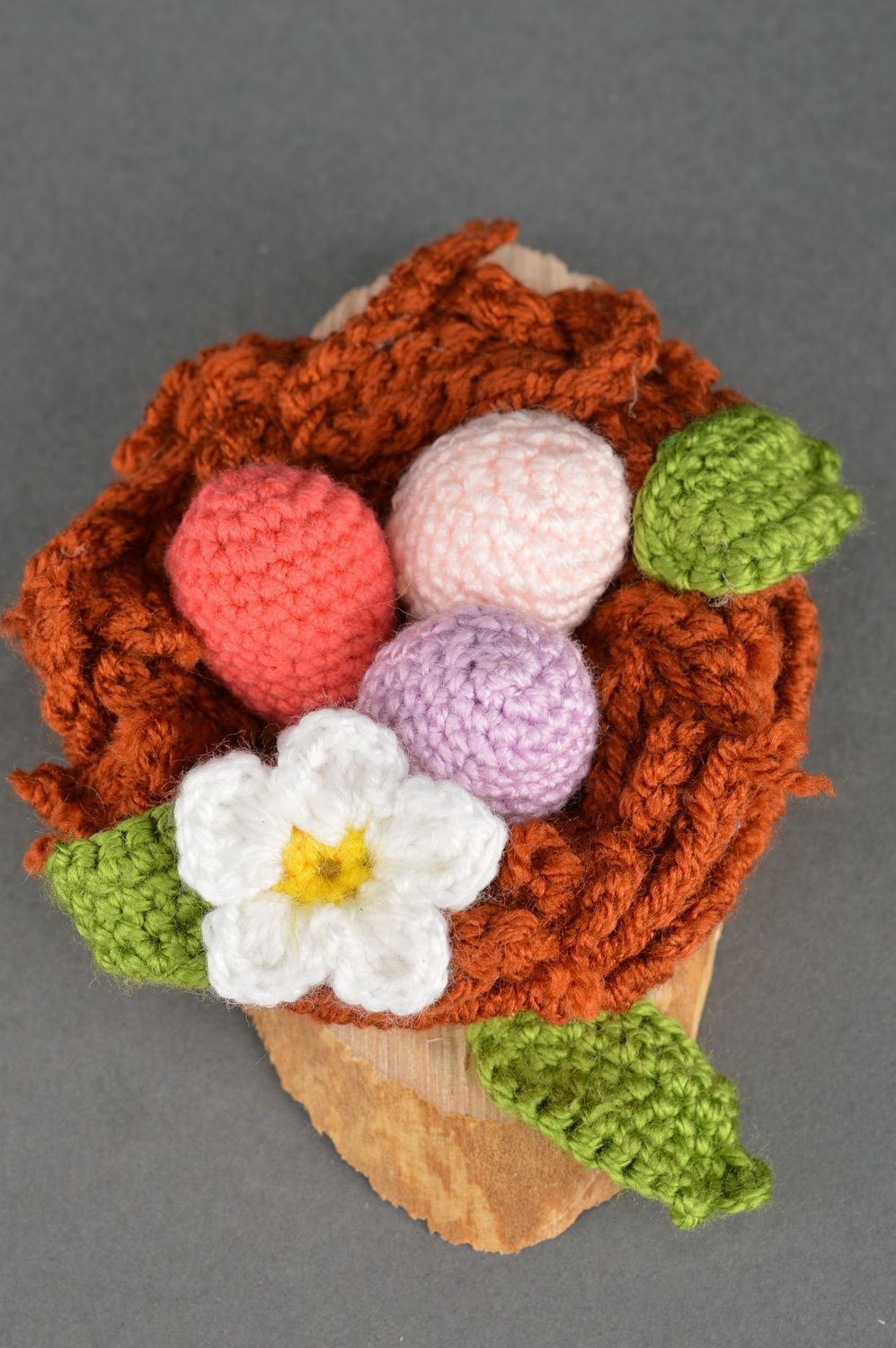 Handmade interior table decoration Easter basket crocheted with colorful eggs photo 2