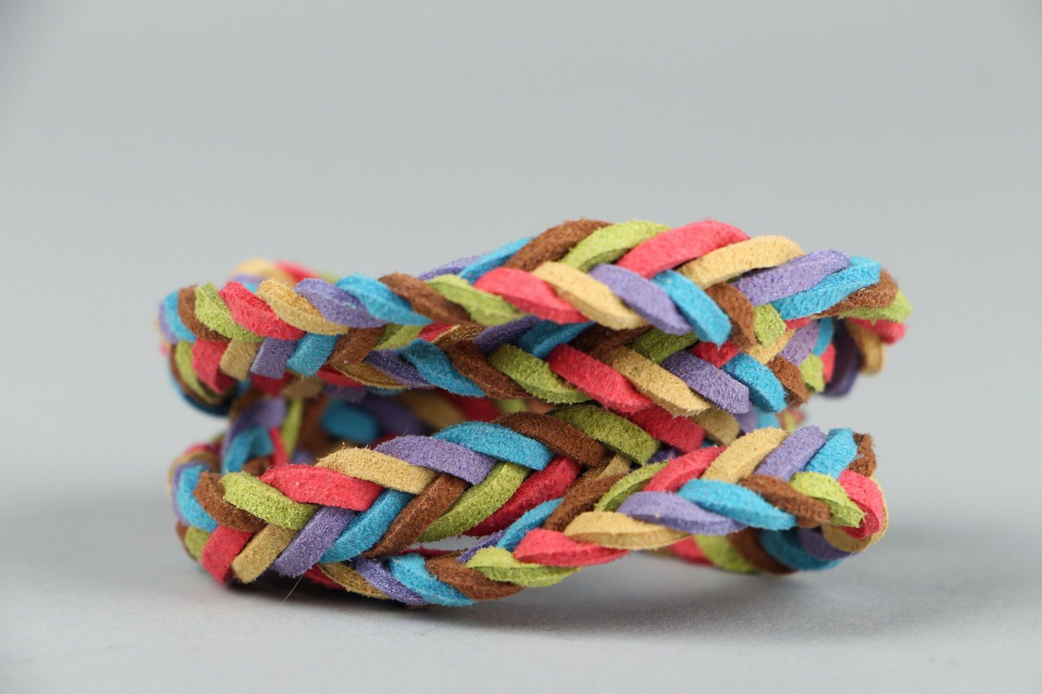 Bright braided bracelet made of suede photo 3
