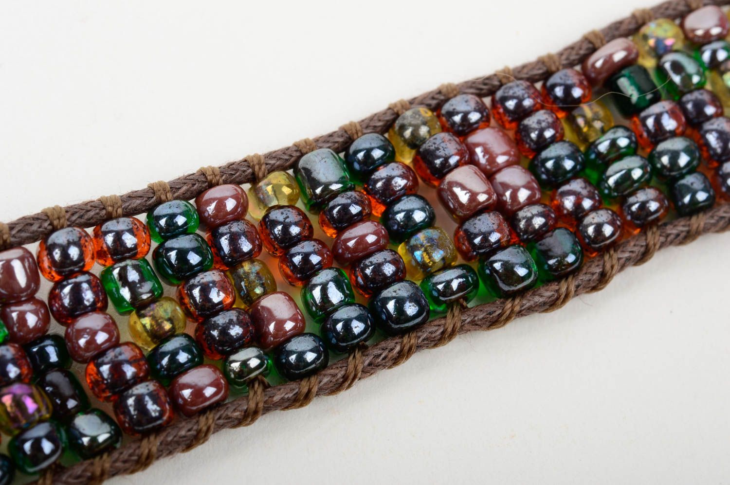 Brown color cord strand beaded bracelet with brown and dark green beads photo 5