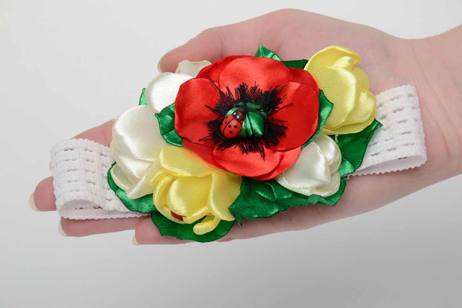 Handgemachtes Haarband mit Blumen foto 5