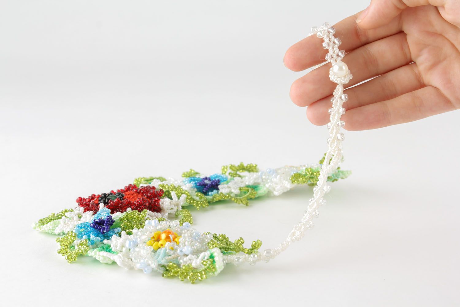 Necklace made of threads and beads Flowers photo 5