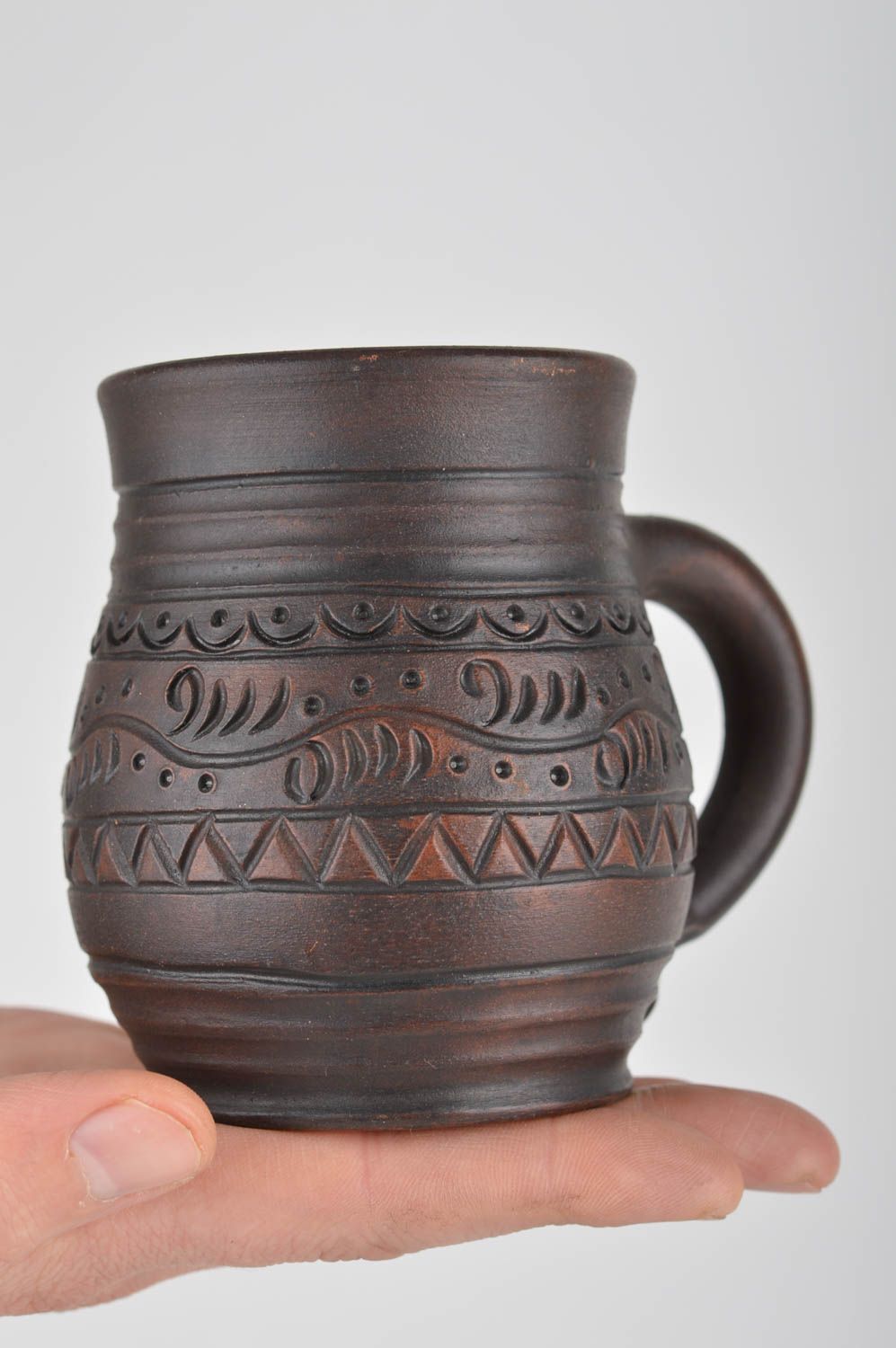 8 oz clay dark brown clay coffee cup with handle and village-style pattern photo 3
