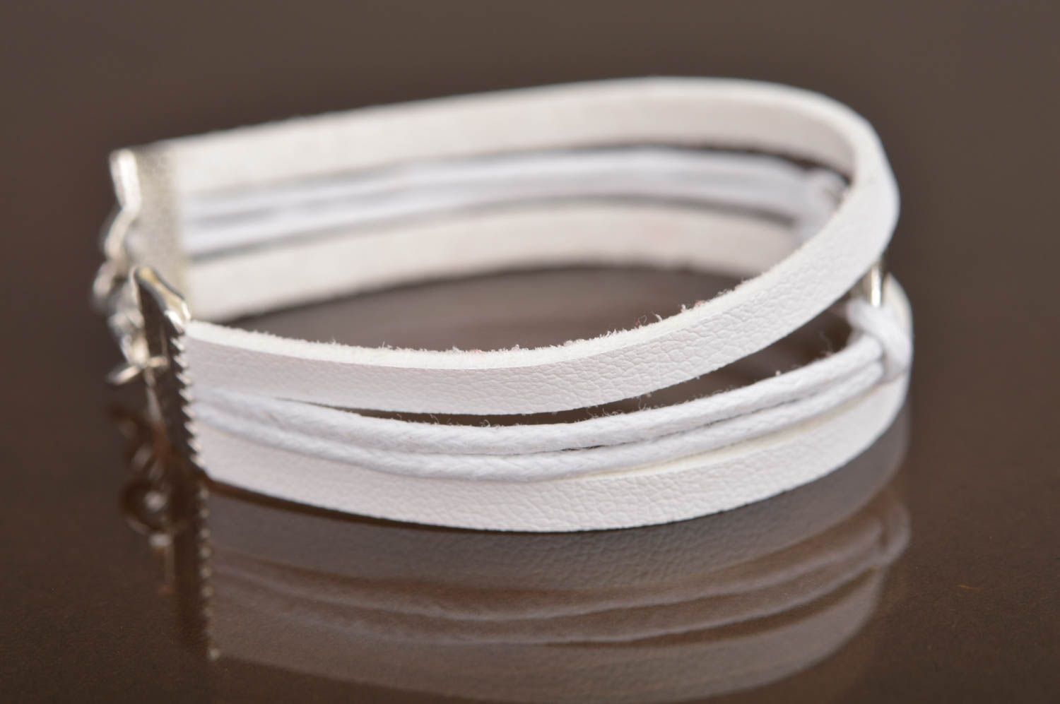 Handmade white laconic genuine leather wrist bracelet with infinity sign insert photo 3