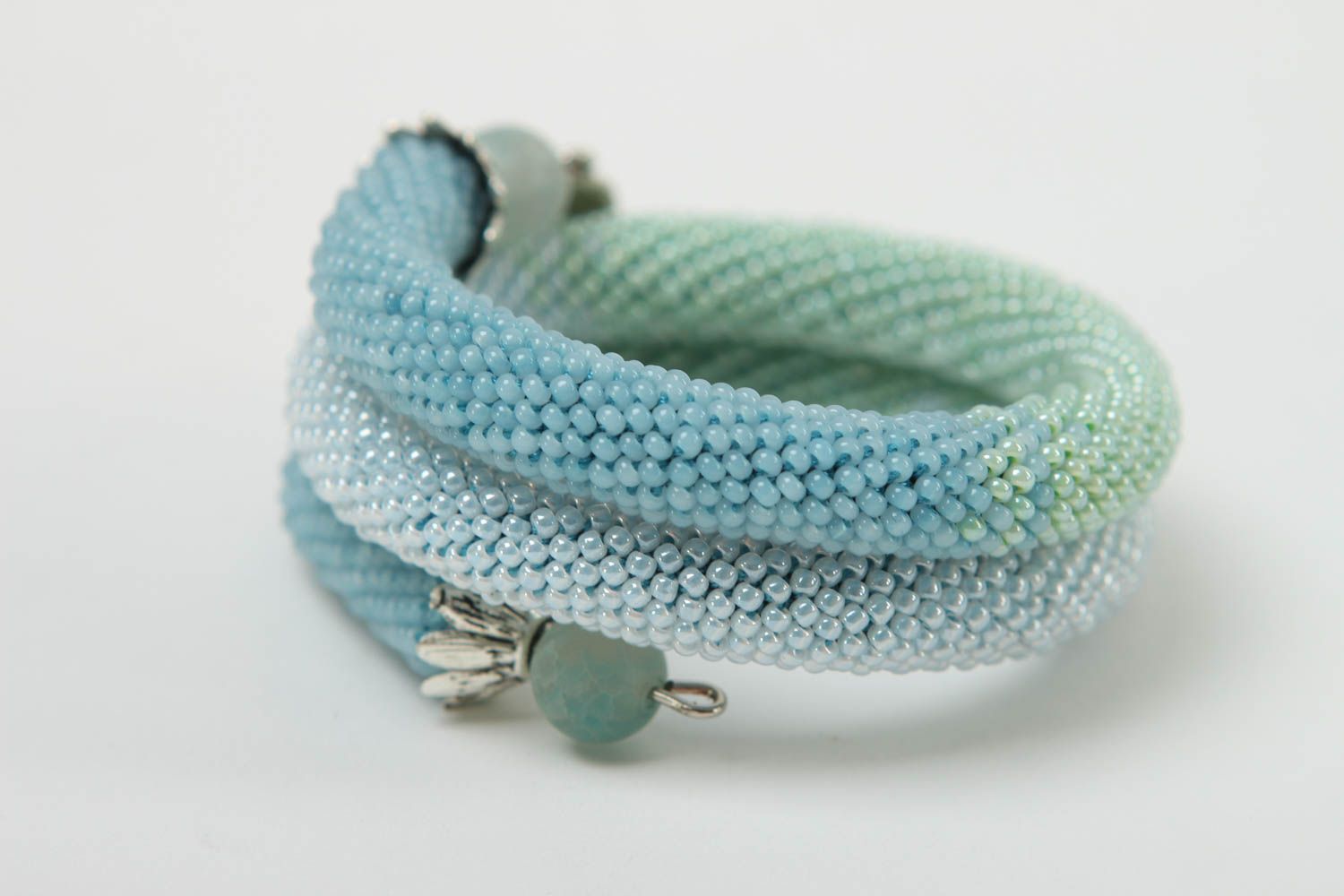 Three-layer cuff cord turquoise color bracelet with silver charms photo 3
