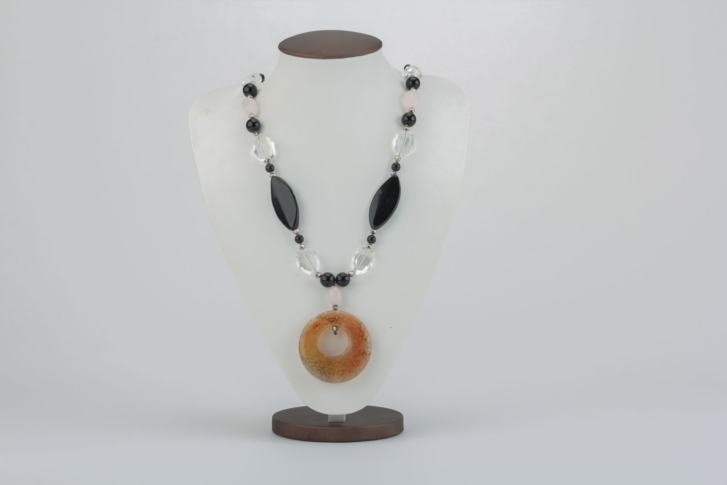 Necklace with a pendant made of natural stones photo 3