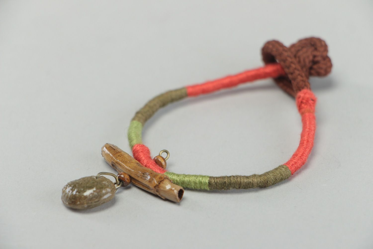 Handmade bright friendship bracelet woven of threads with seaweed in epoxy resin photo 2