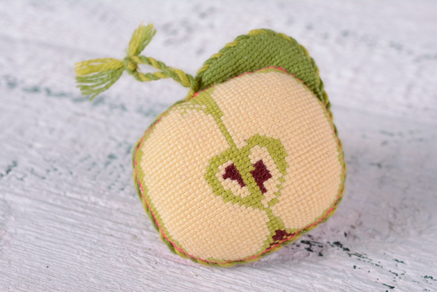 Handmade soft pincushion in the shape of apple with cross stitch embroidery photo 1