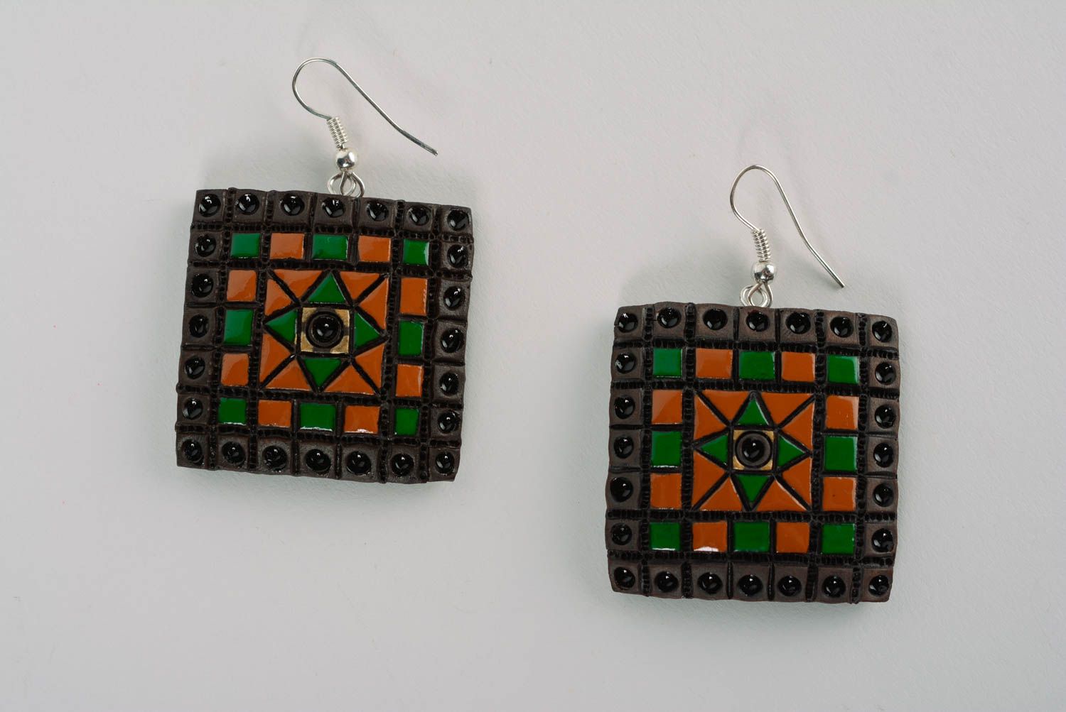 Handmade square painted beautiful earrings made of clay milk firing technique photo 1