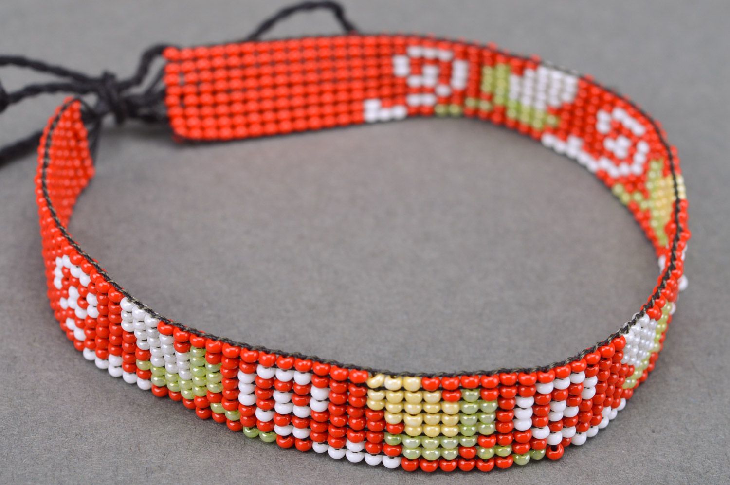 Handmade red bead woven necklace with ties and floral ornaments for women photo 2