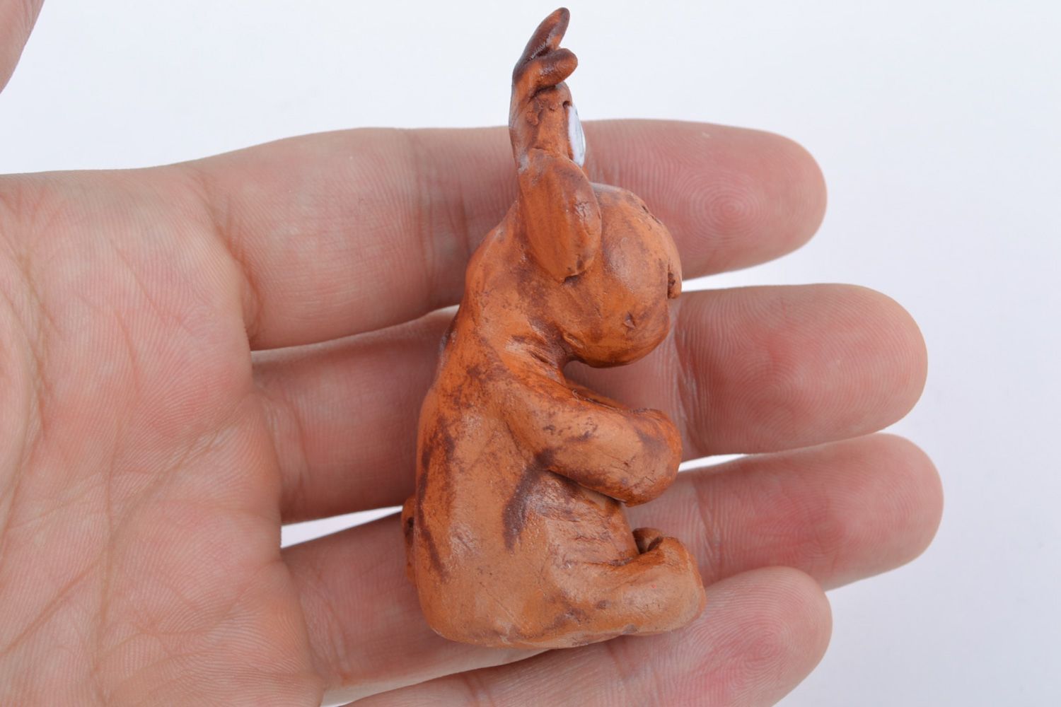 Small handmade ceramic figurine in the shape of monkey for interior decoration photo 2