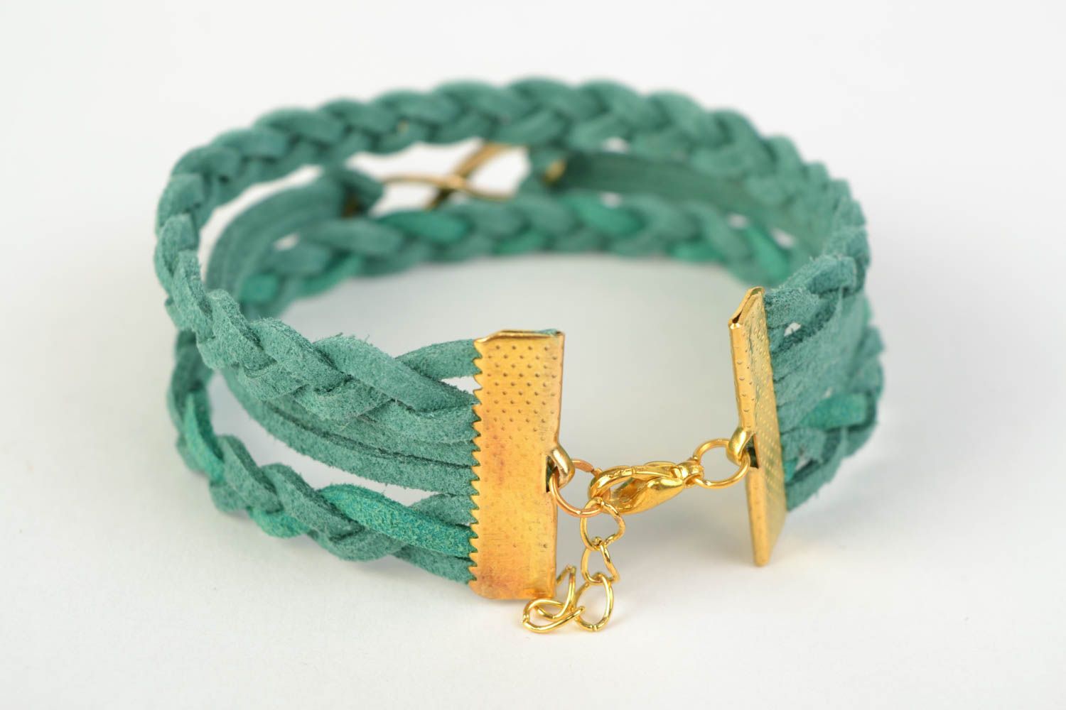 Handmade multi row suede cord woven wrist bracelet of turquoise color with charm photo 4