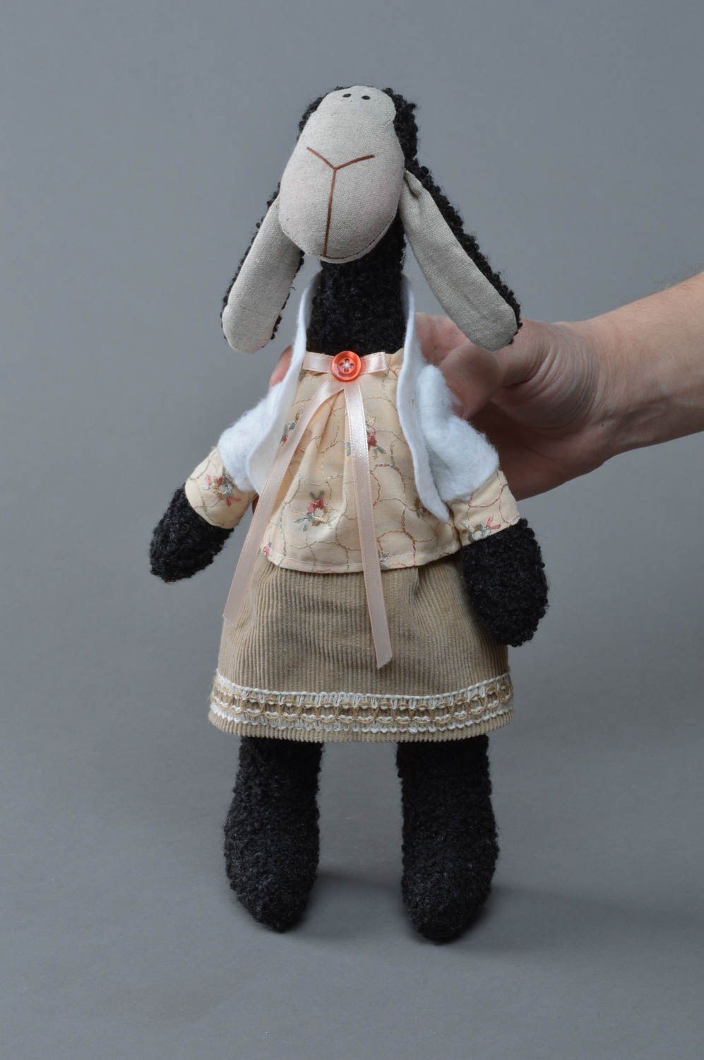 Beautiful handmade collectible textile soft toy sewn of felt and artificial fur in the shape of sheep photo 4