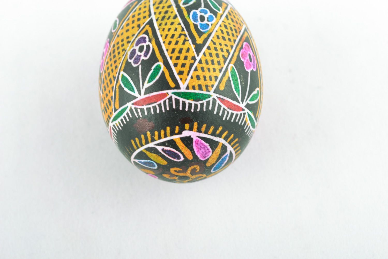 Handmade Easter egg with floral ornament painted with hot wax and aniline dyes photo 4