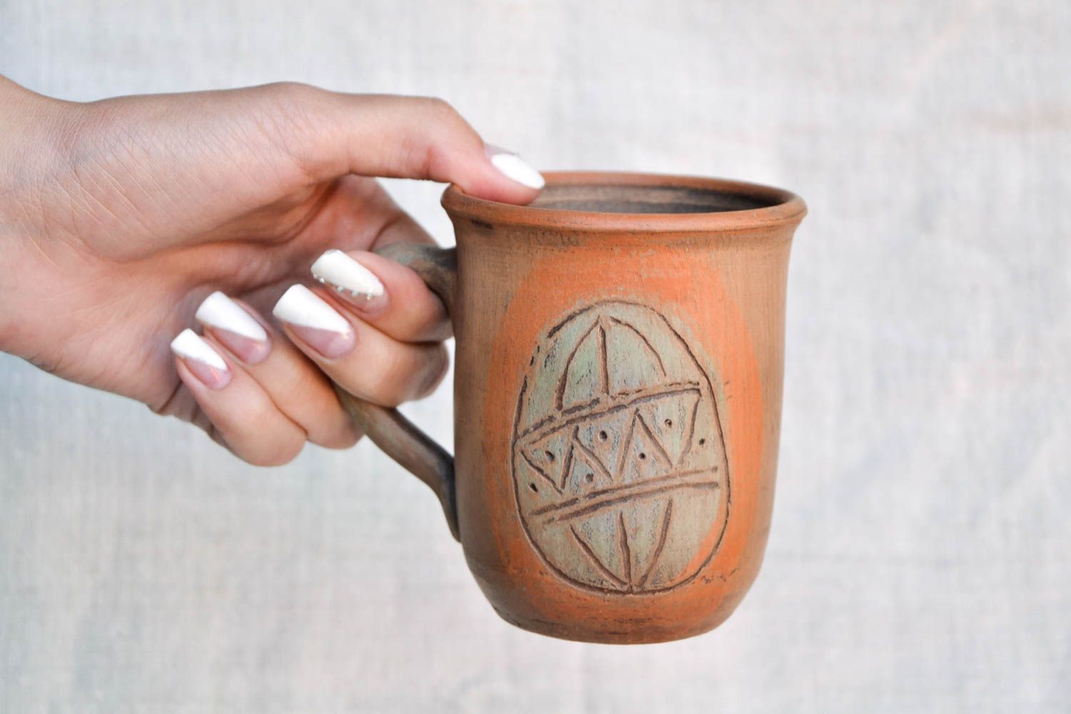 Tall ceramic drinking handmade cup with handle and Easter egg pattern photo 2