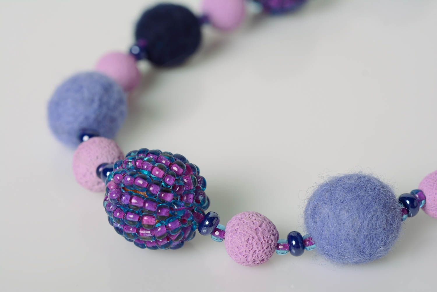 Handmade designer felted wool balls necklace with seed beads in violet color photo 3