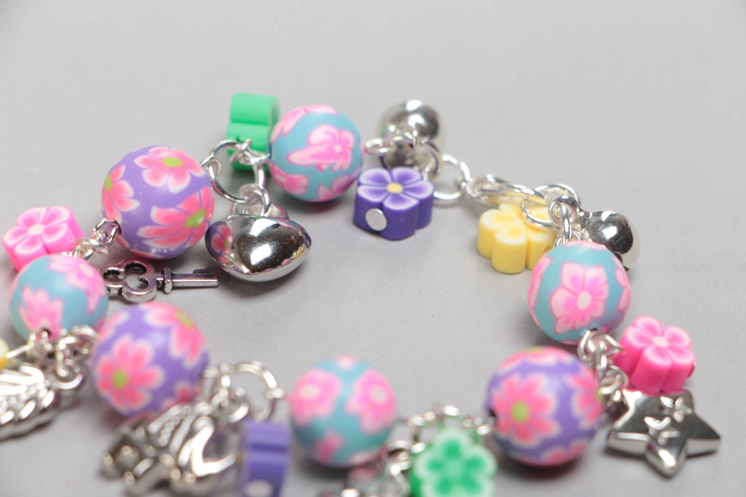 Bright colorful handmade children's polymer clay wrist bracelet with charms photo 4