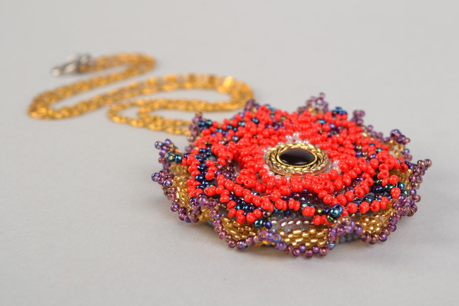 Handmade designer bead embroidered pendant with stones in red color palette photo 3