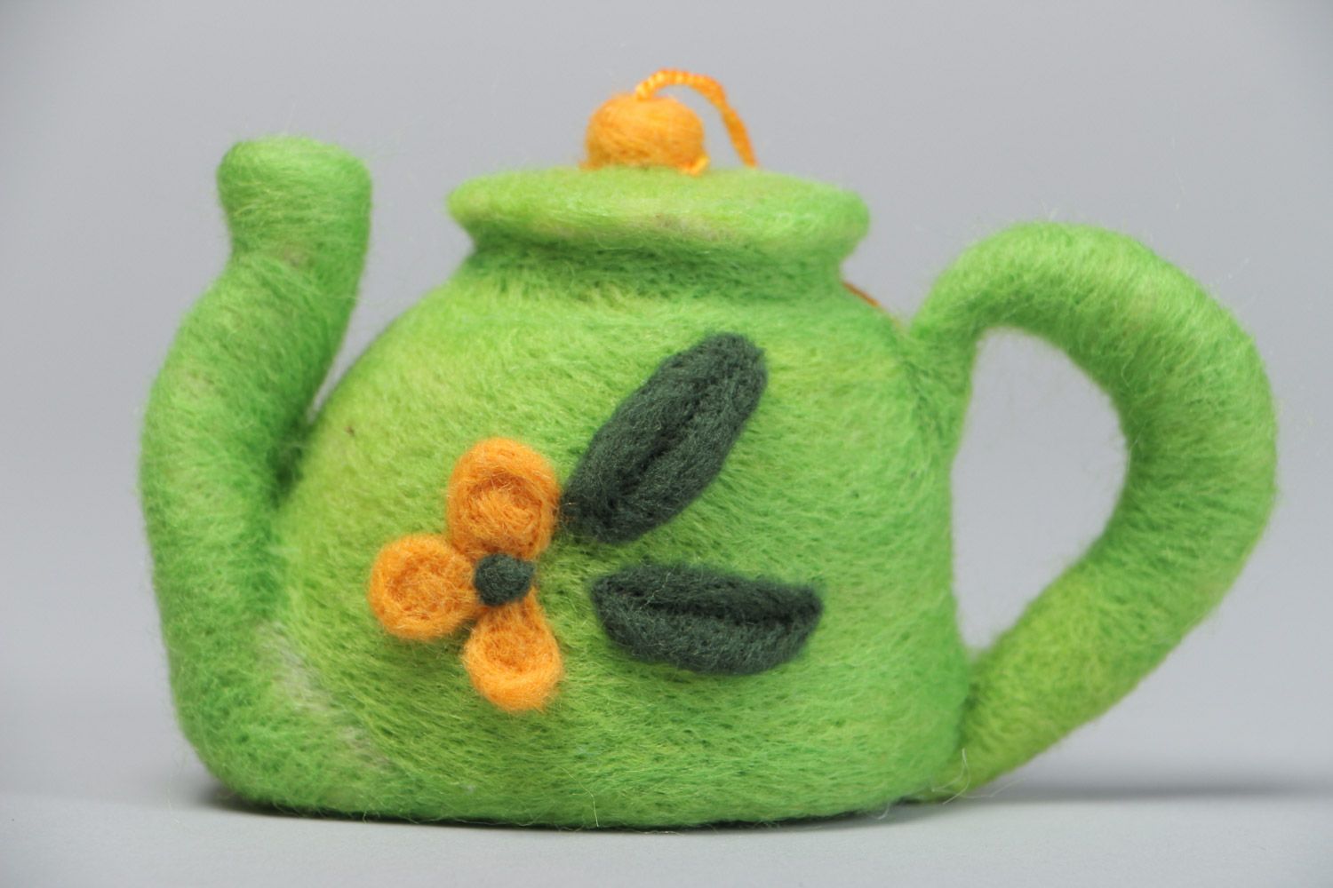Handmade decorative toy made using the technique of dry felting green kettle with eyelet photo 2