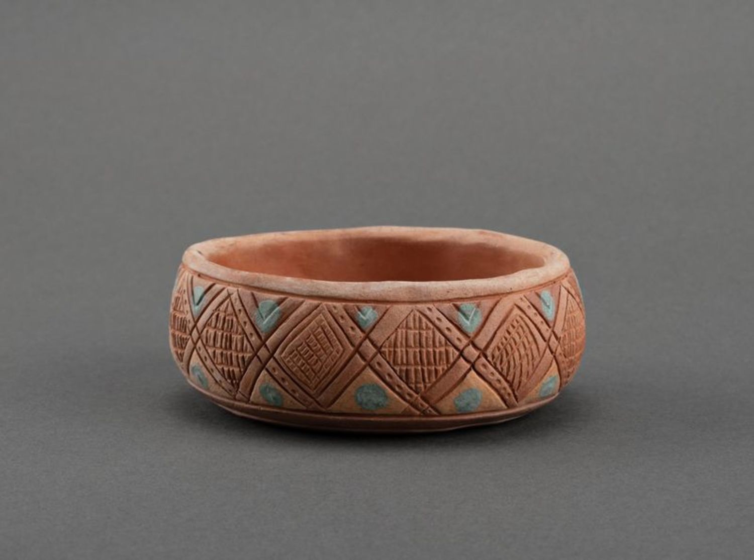 Cinzeiro de cerâmica étnico foto 2