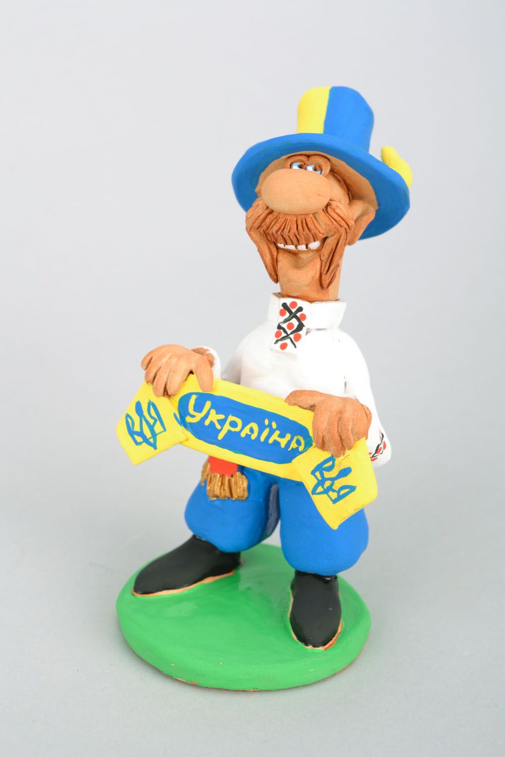 Bunte Figurine aus Ton Sportfan foto 3