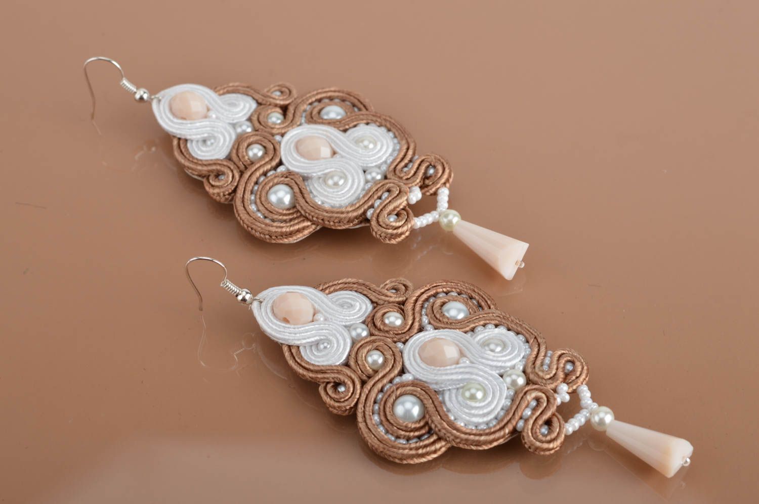 Beautiful handmade designer long soutache earrings of white and creme colors photo 2