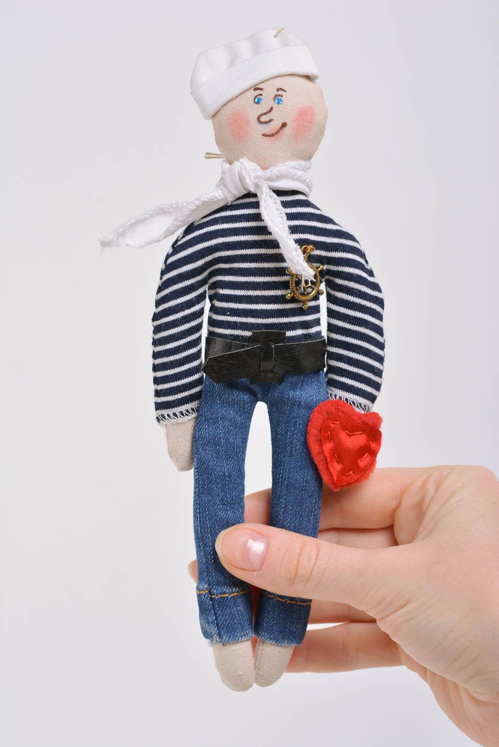 Handmade designer interior soft toy boy sailor in striped sweater and white hat photo 1