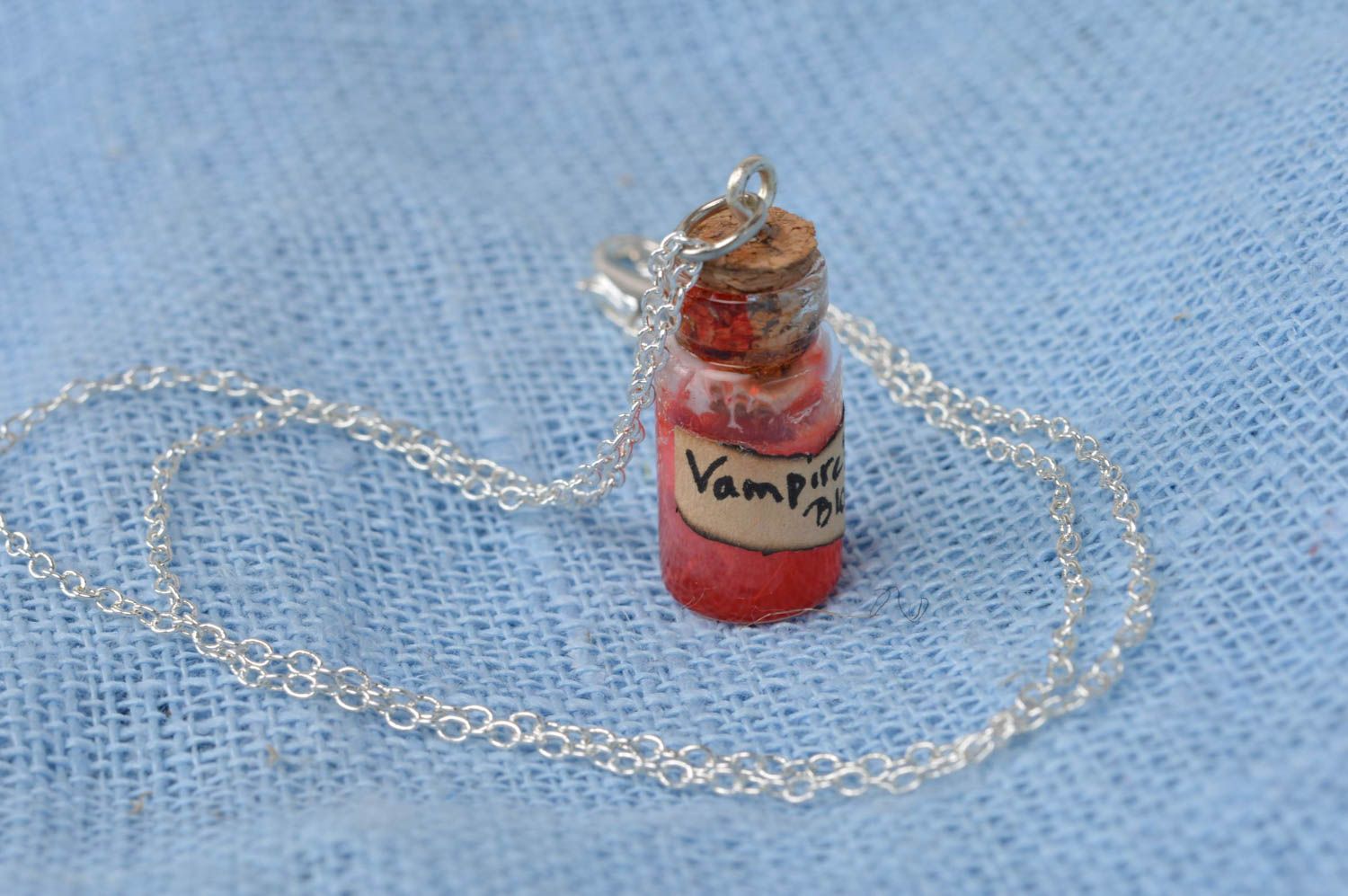 Handmade stylish cute red pendant in shape of glass jar with epoxy resin photo 2