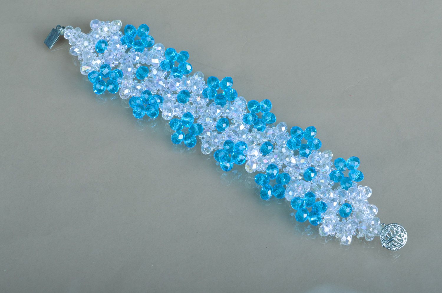 Beautiful handmade women's volume beaded bracelet of gentle white and blue colors photo 2