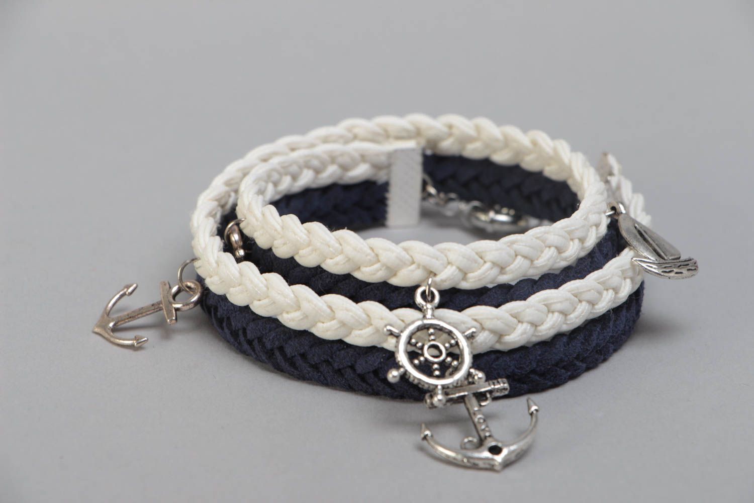 Handmade multi row wrist bracelet woven of suede cord in marine style with charm photo 3