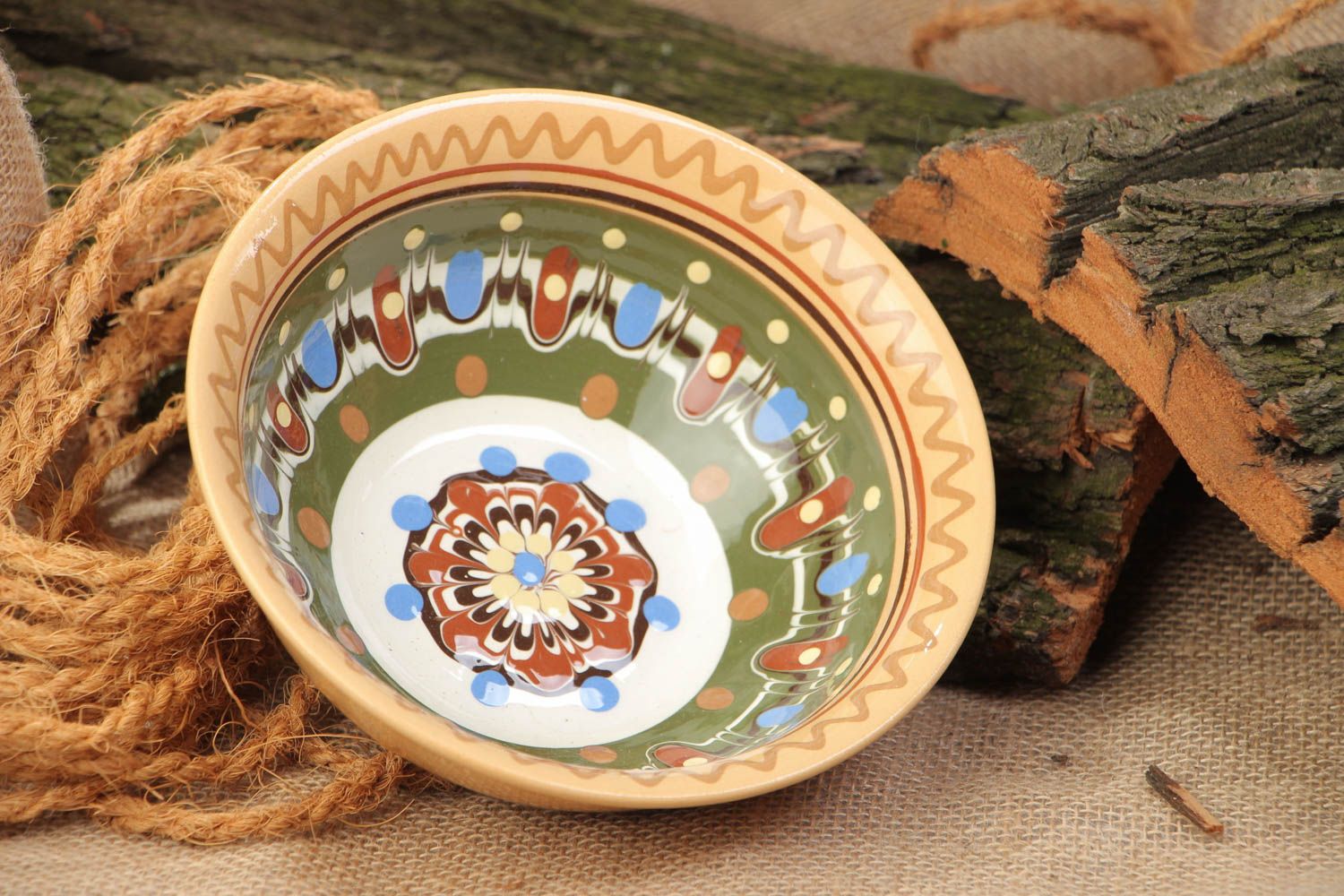 Handmade decorative ceramic bowl for 500 ml painted with ornaments with glaze photo 1