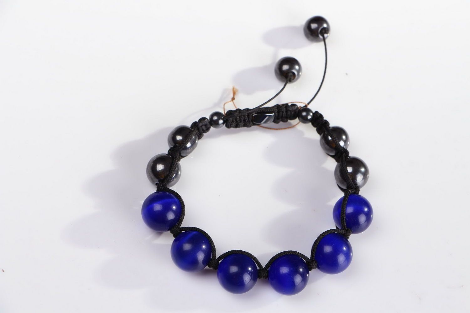 Bracelet en perles œil de chat bleues et hématite photo 4
