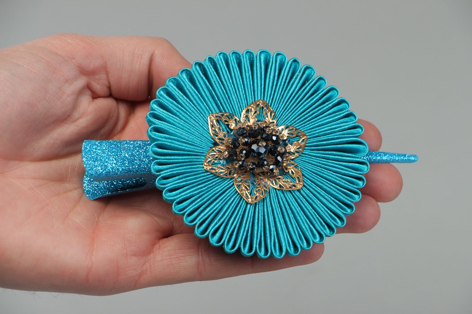 Bright handmade hair clip with kanzashi flower created of blue satin ribbons photo 4