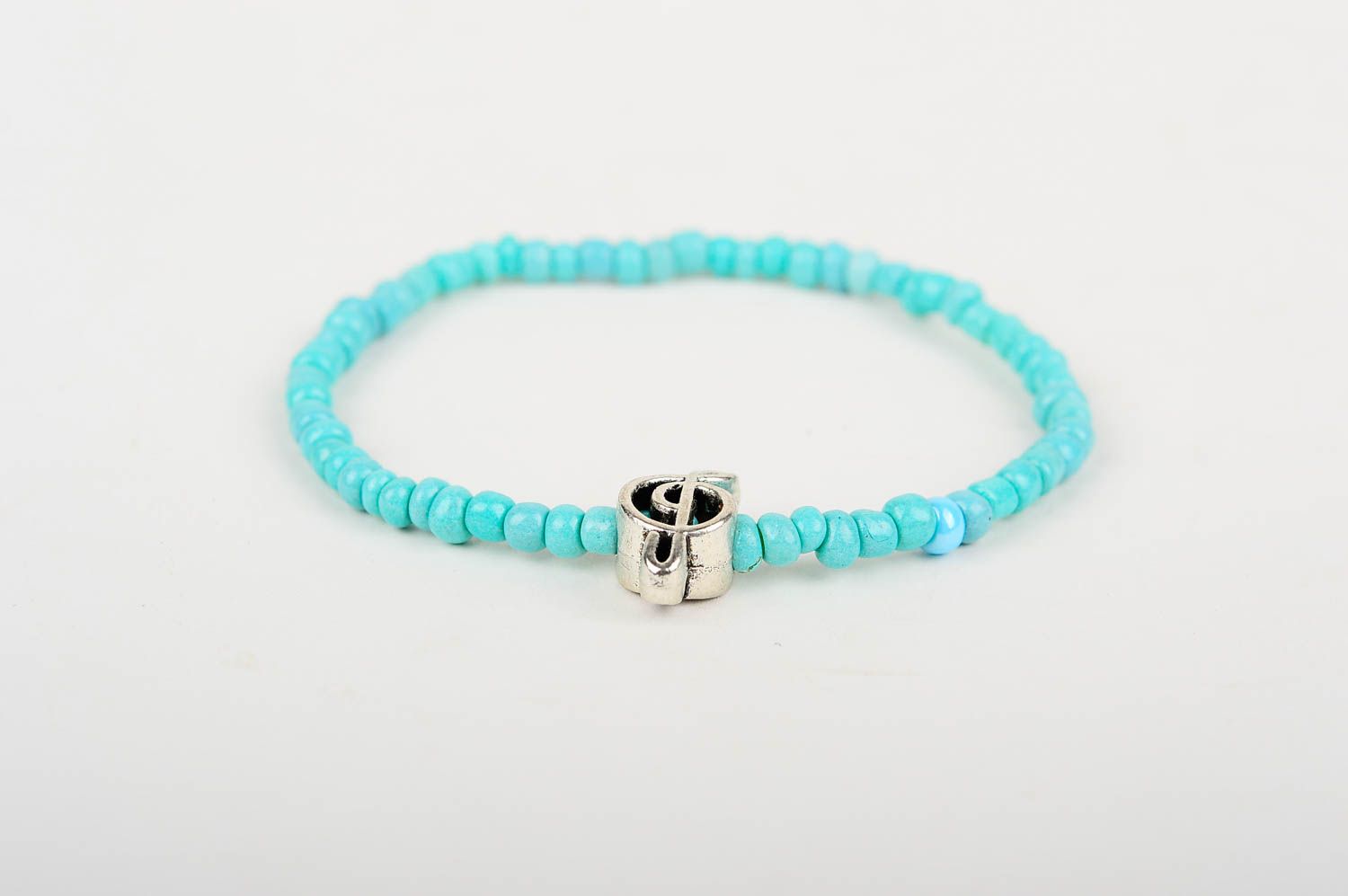 Turquoise handmade beaded bracelet with treble clef charm for young girls photo 3