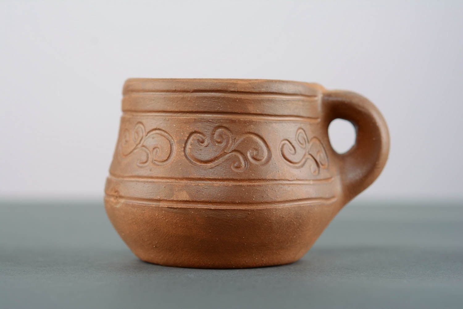 5 oz red clay not glazed lead-free coffee cup with handle and rustic floral pattern photo 4