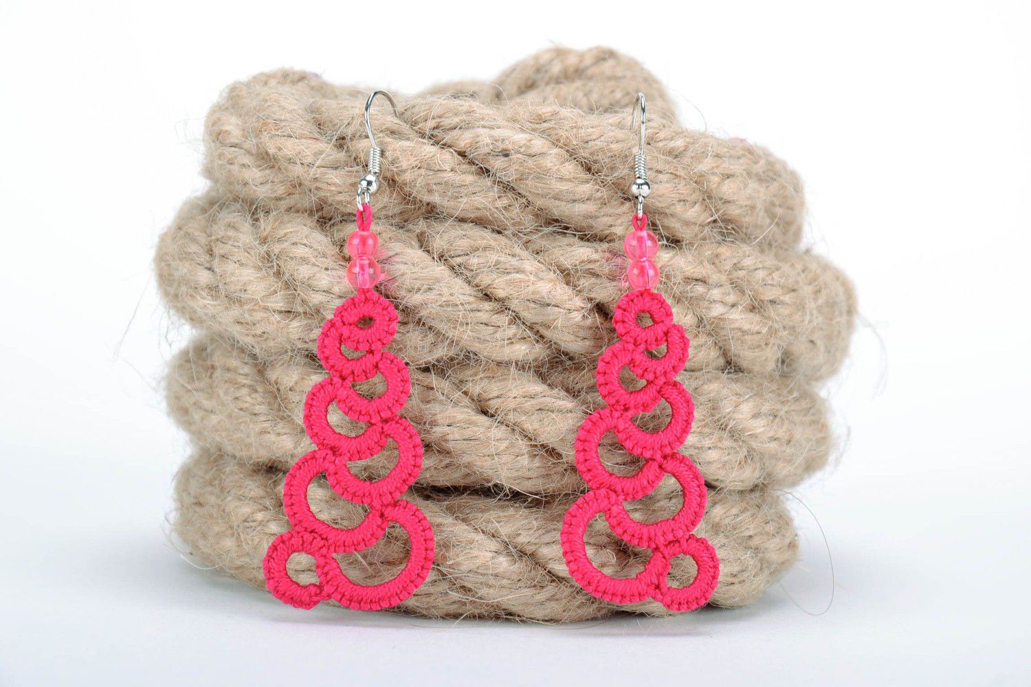 Crimson earrings made from woven lace photo 2