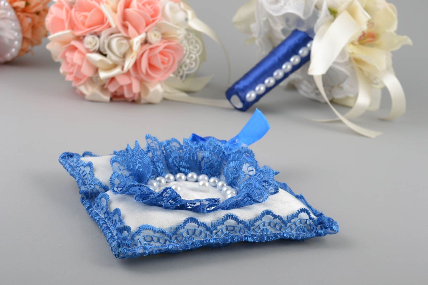 Unusual beautiful homemade white wedding ring pillow with beads and blue lace photo 1