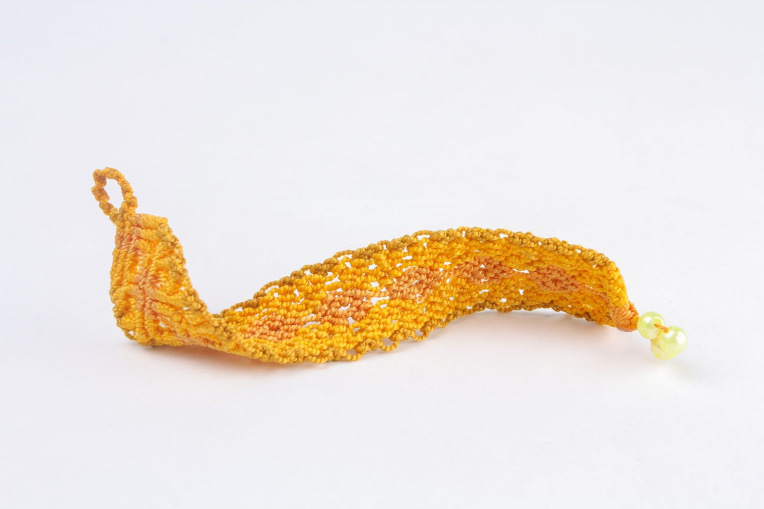 Желтый плетеный браслет  фото 5