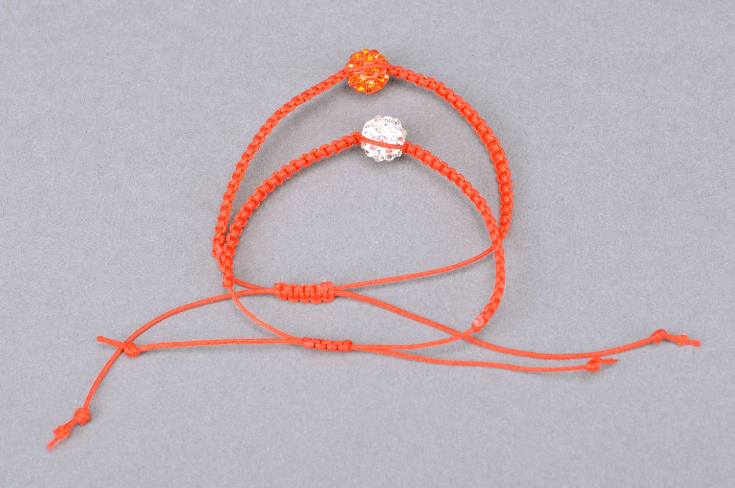 Set of 2 handmade orange friendship wrist bracelets woven of threads with beads  photo 5