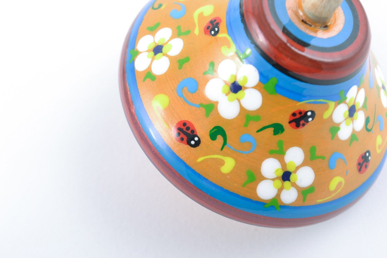 Bright handmade wooden spin top toy painted with eco dyes for children photo 5