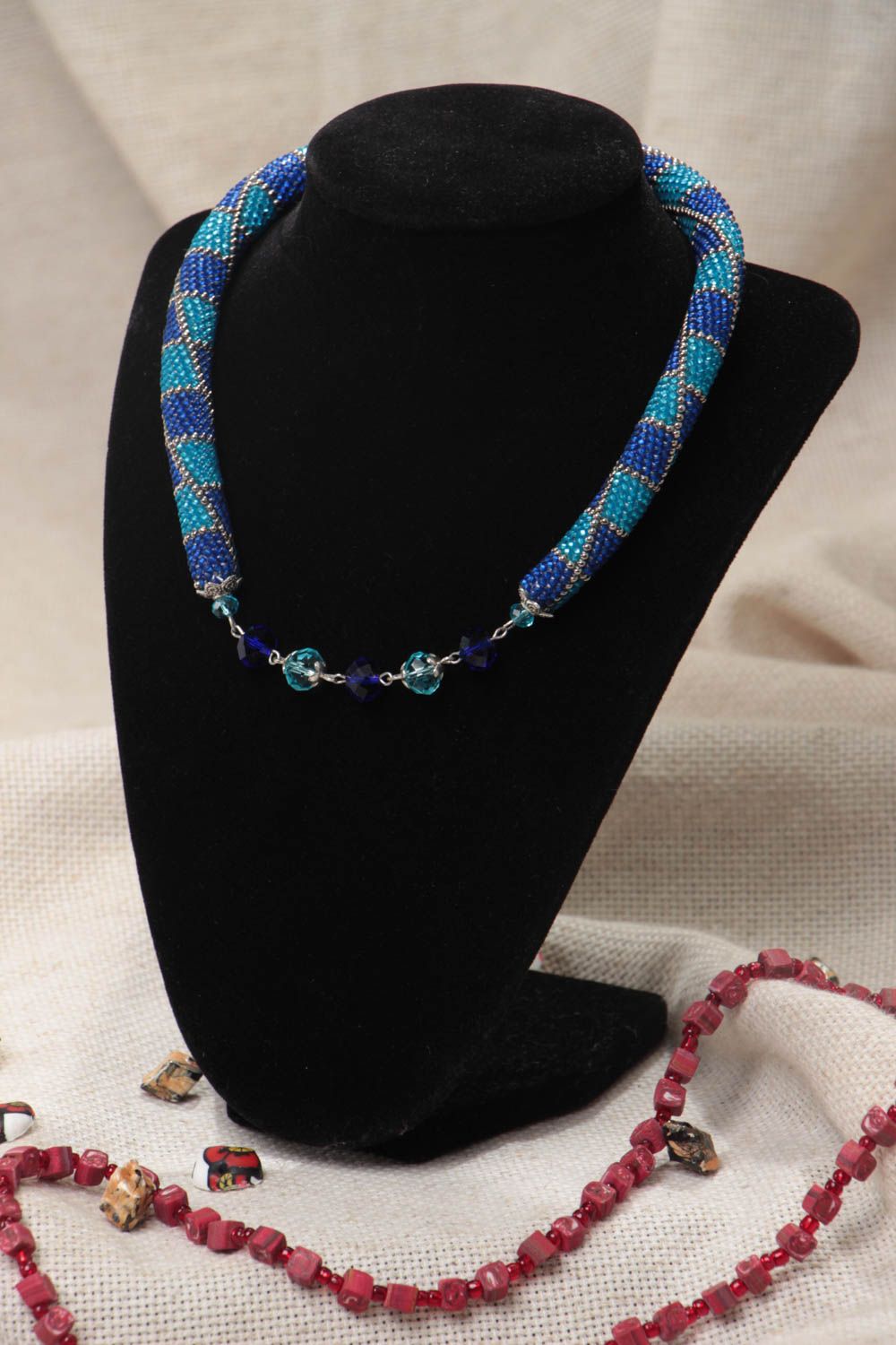 Handmade stylish beaded cord necklace in blue color palette with faceted beads photo 1