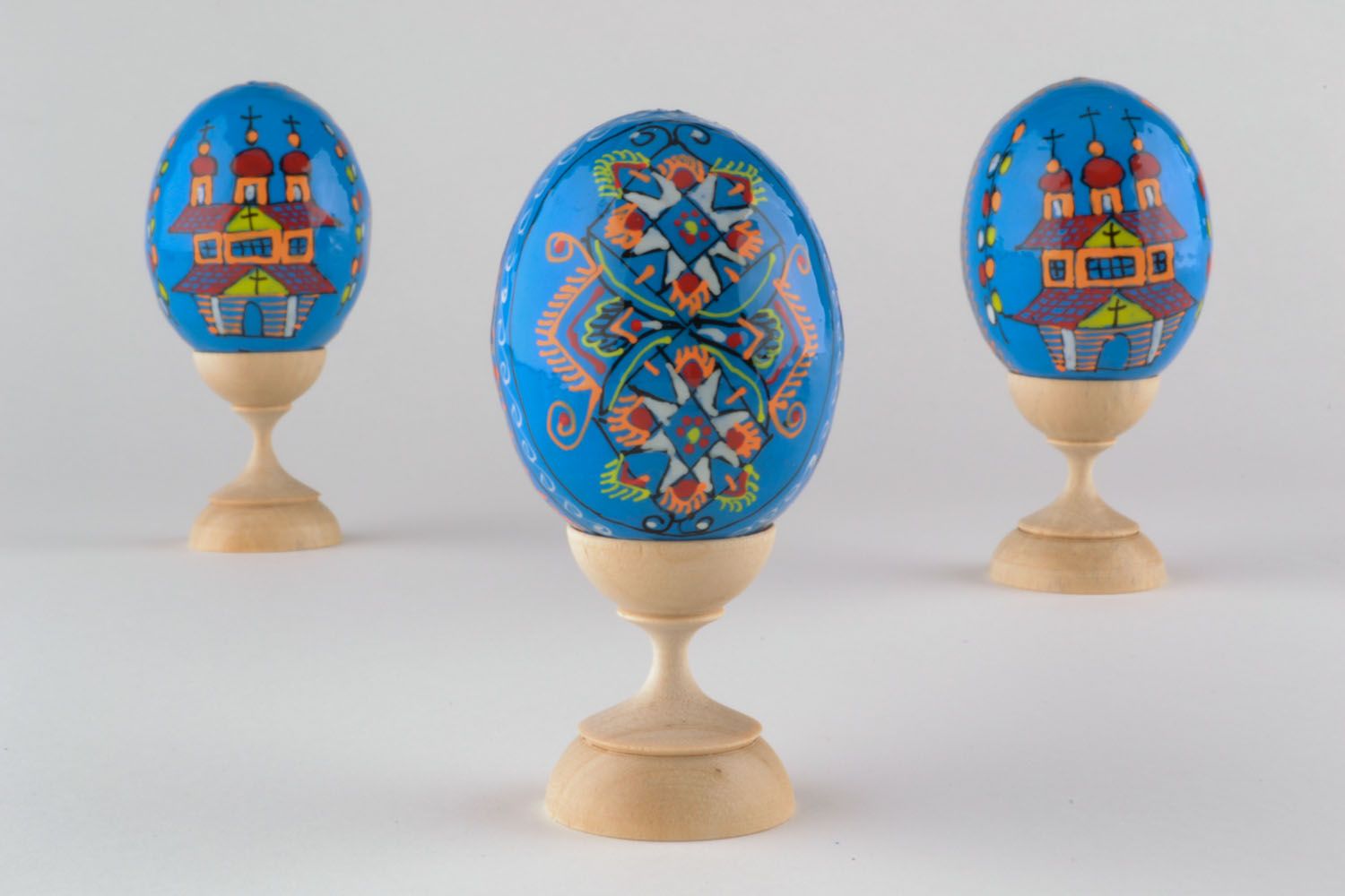Blue Easter egg with paintings photo 1