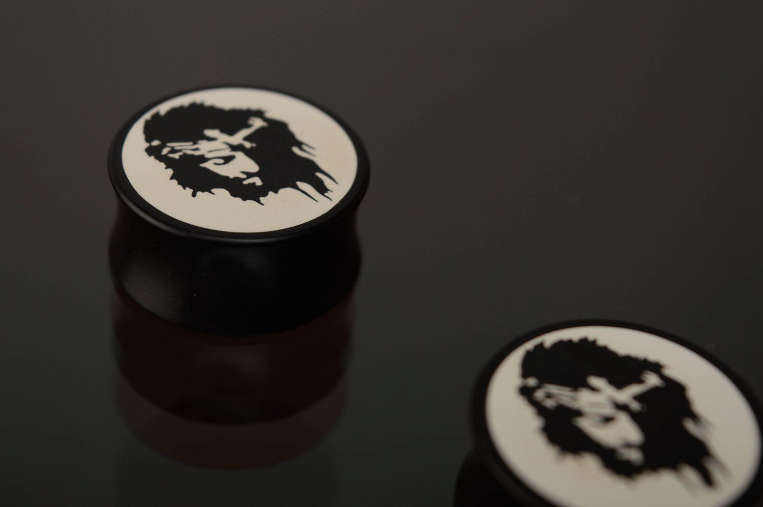 Black and white hard rubber ear plugs with engraving photo 5