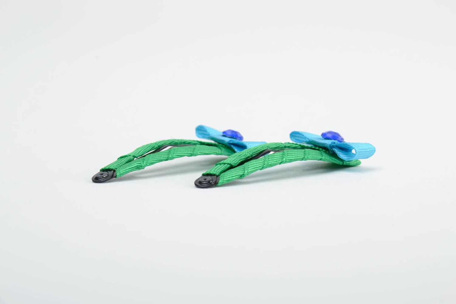 Small handmade green hair clips made of rep ribbons and metal present for child photo 3
