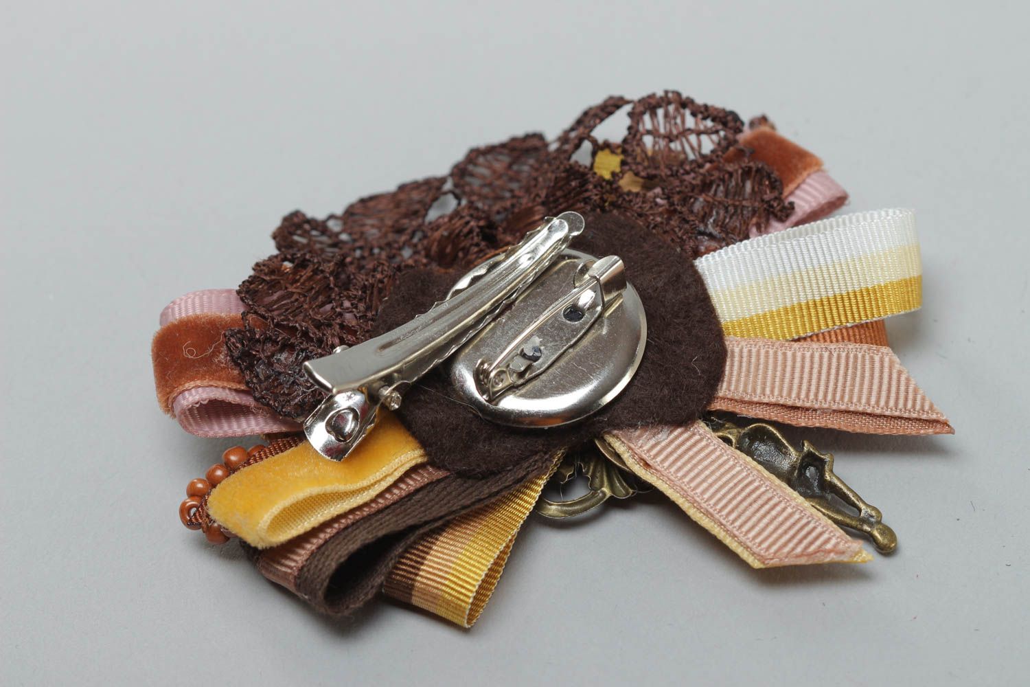 Handmade rep ribbon brooch with lace and charms in brown color palette photo 4