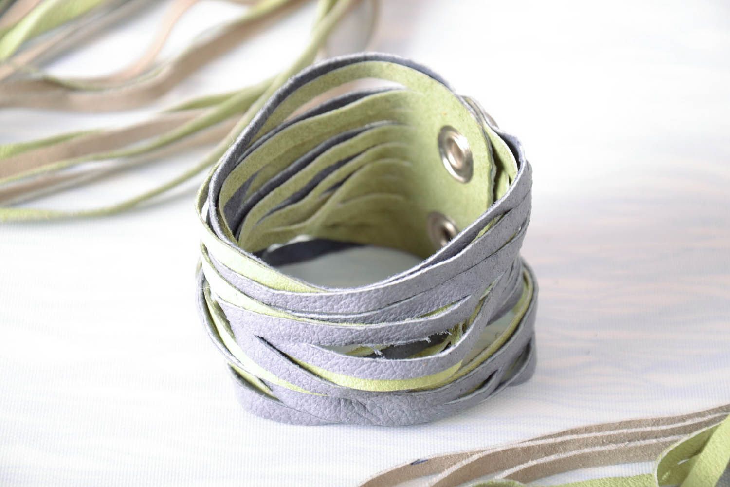Broad two-layered leather bracelet photo 1
