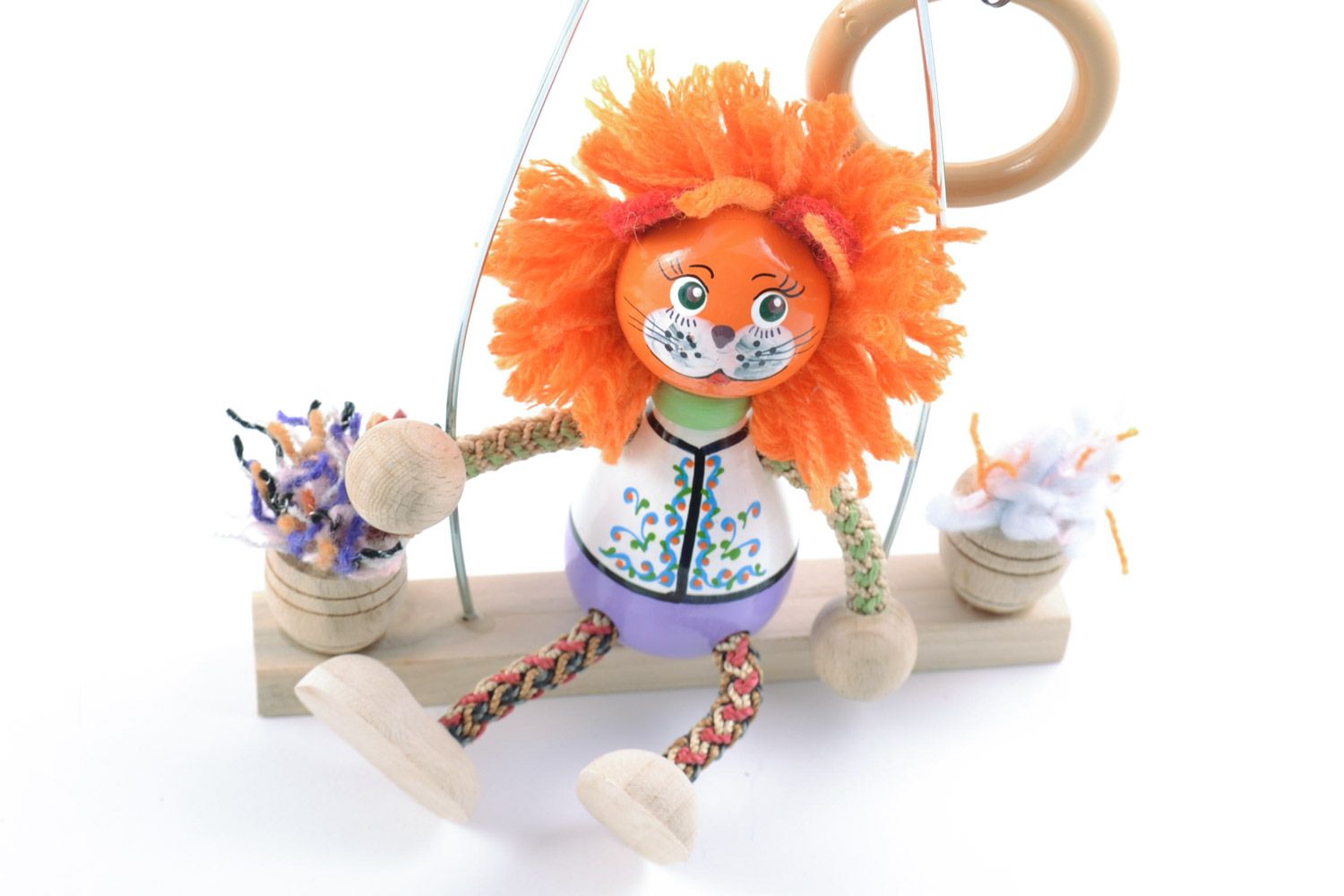 Handmade painted wooden eco toy lion with orange mane on swing photo 4