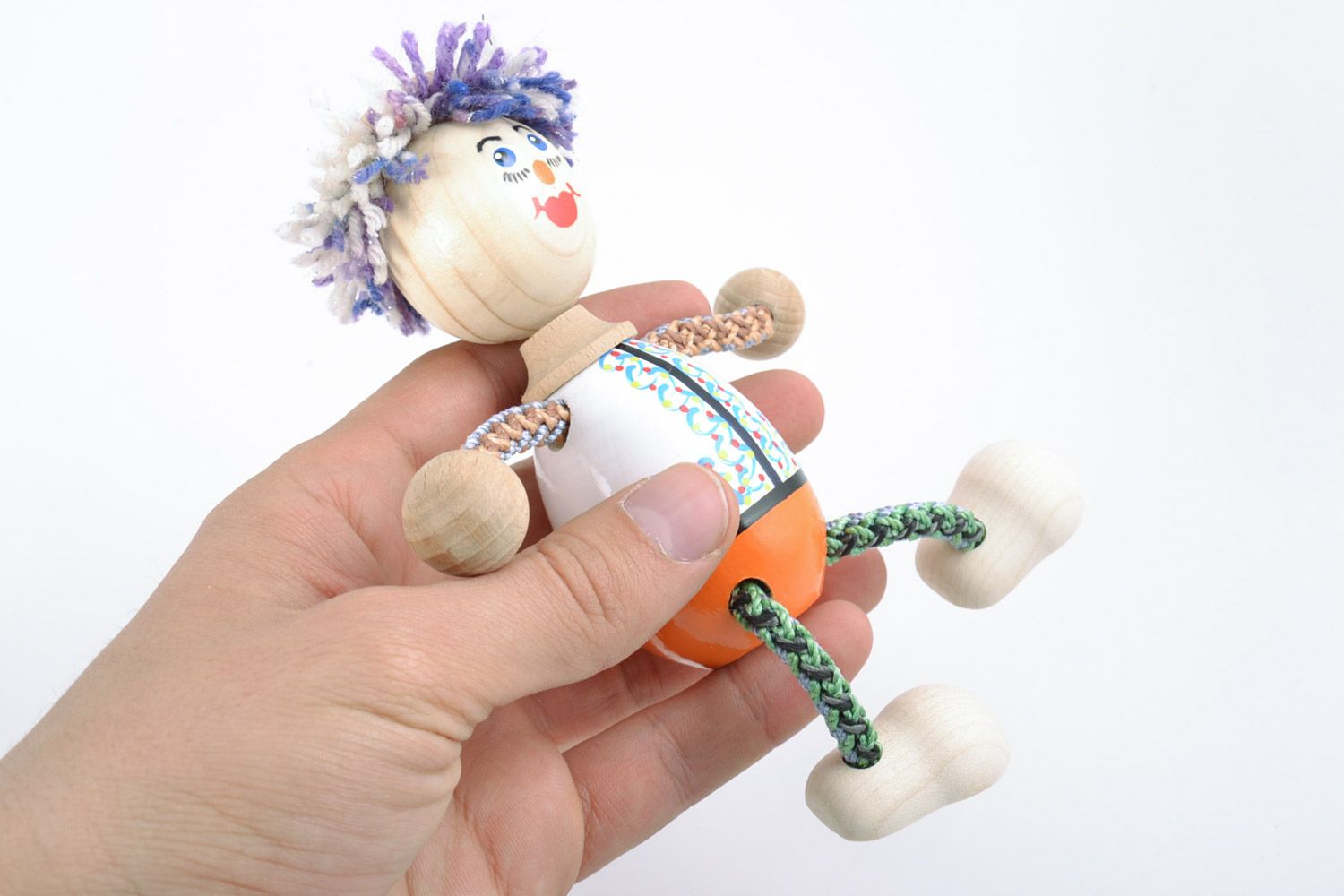 Handmade beech wood toy boy painted with eco dyes  photo 2